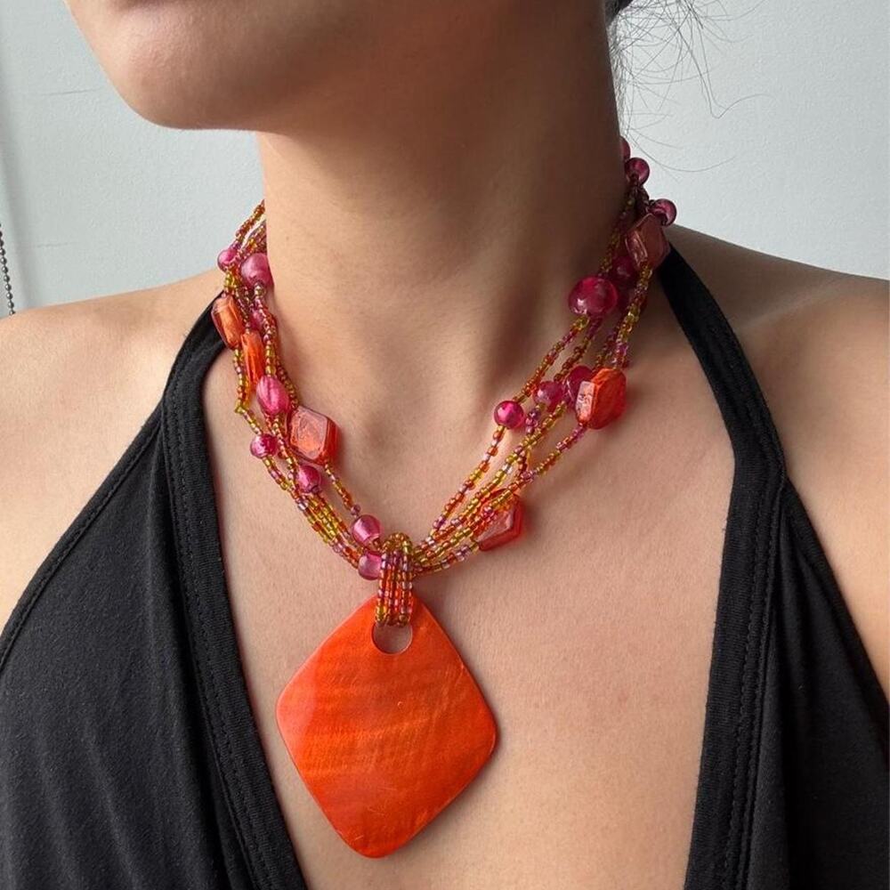 Orange & pink beaded necklace with a large orange diamond pendant